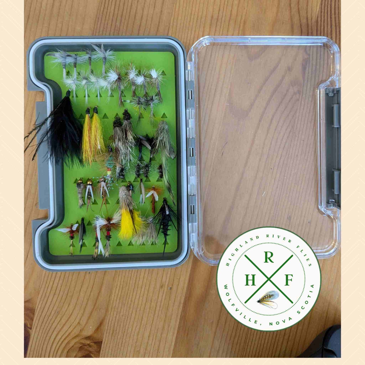 Assorted trout flies in a fly box