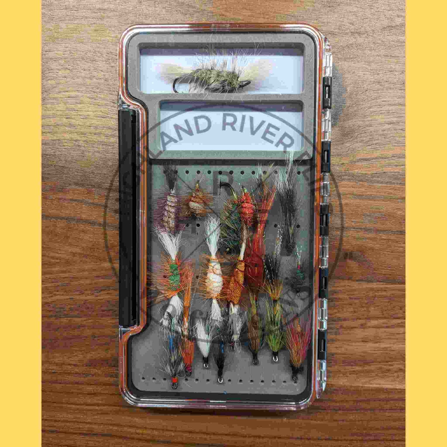 salmon fly assortment in fly box