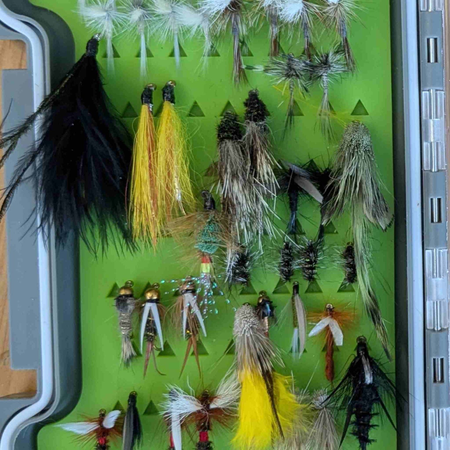 trout flies in a fly box
