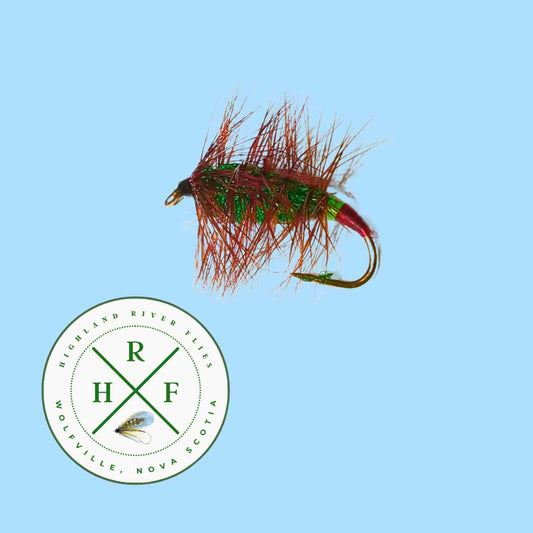 Fishing fly with red and green body on a blue background, featuring a logo at the bottom.