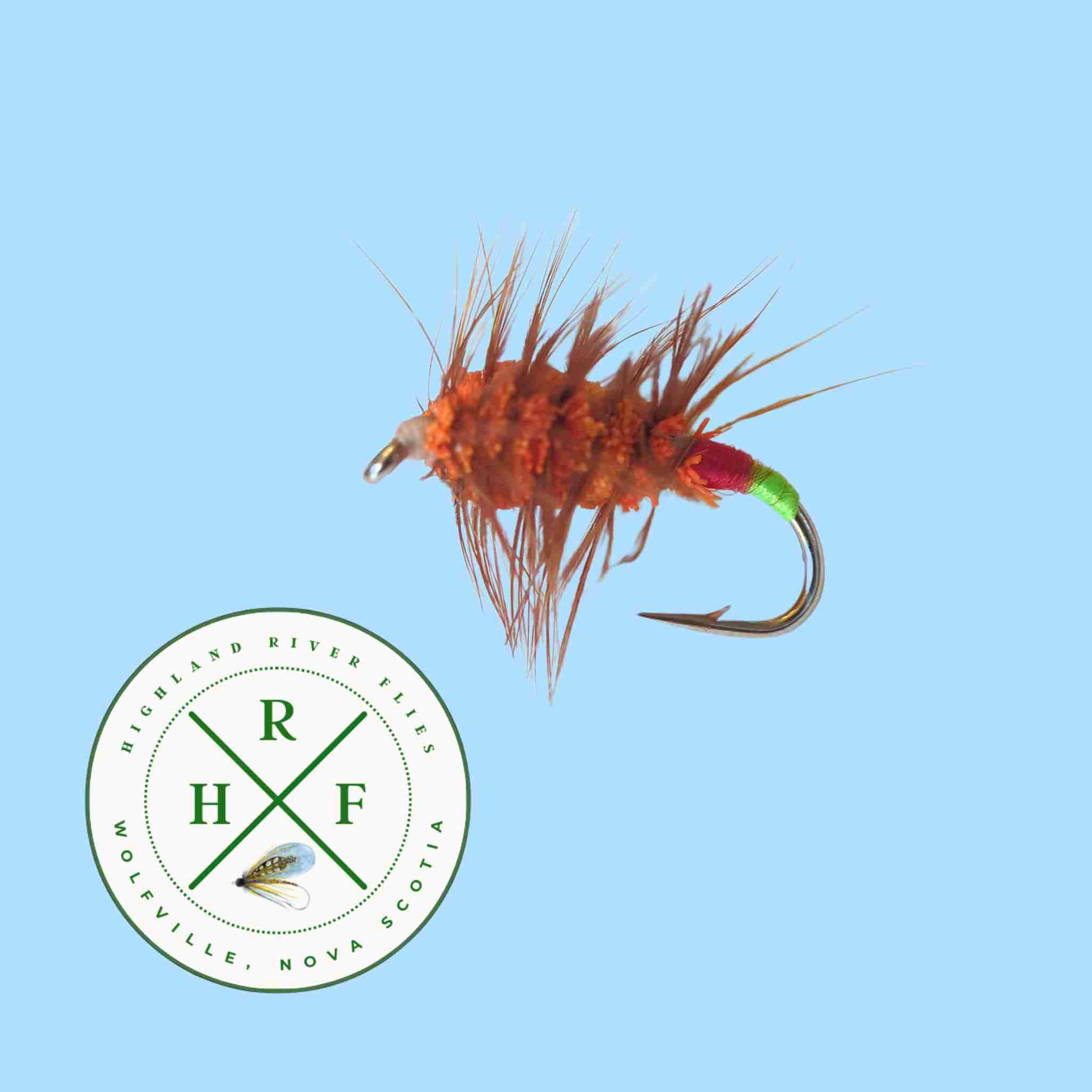 Fishing fly with a branded logo on a light blue background