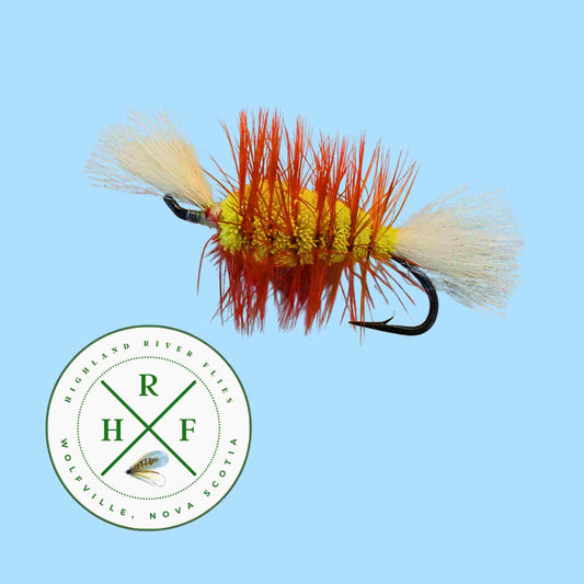 Fishing fly with orange and yellow details on a blue background, featuring the RHF logo.