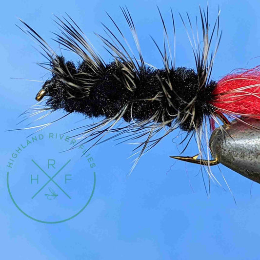 Black Woolly Worm Fly